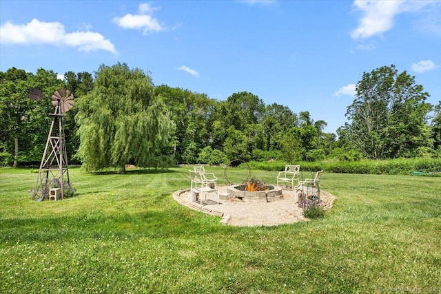 367 Pine Hill Rd, Sterling, CT 06377 - view of green lawn featuring an outdoor fire pit