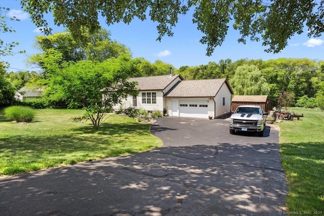 367 Pine Hill Rd, Sterling, CT 06377 - view of front facade featuring driveway, a front yard, and a garage