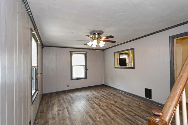 205 Lee St, West Haven, CT 06516 - spare room featuring wood finished floors, ceiling fan, crown molding, and wooden walls