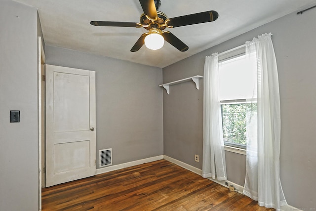 205 Lee St, West Haven, CT 06516 - empty room with wood finished floors and a ceiling fan