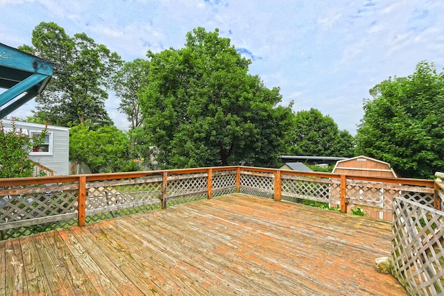 205 Lee St, West Haven, CT 06516 - wooden deck featuring view of scattered trees