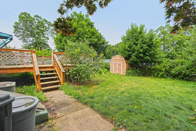 205 Lee St, West Haven, CT 06516 - view of green lawn with a storage unit, a deck, and stairs