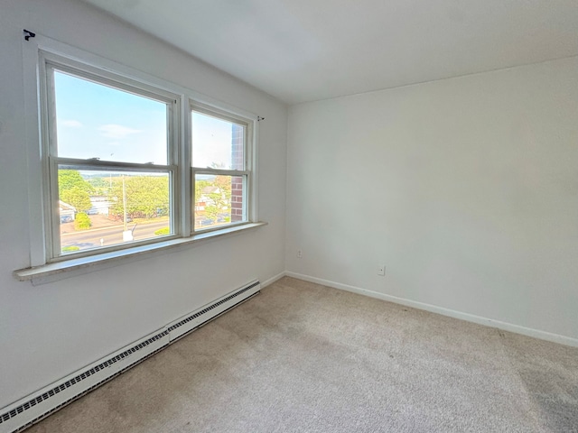 1730 State St Apt 306, Hamden, CT 06517 - unfurnished room featuring a baseboard heating unit and carpet floors