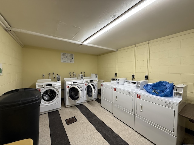 92 Wilton Crst, Wilton, CT 06897 - community laundry room with separate washer and dryer and concrete block wall
