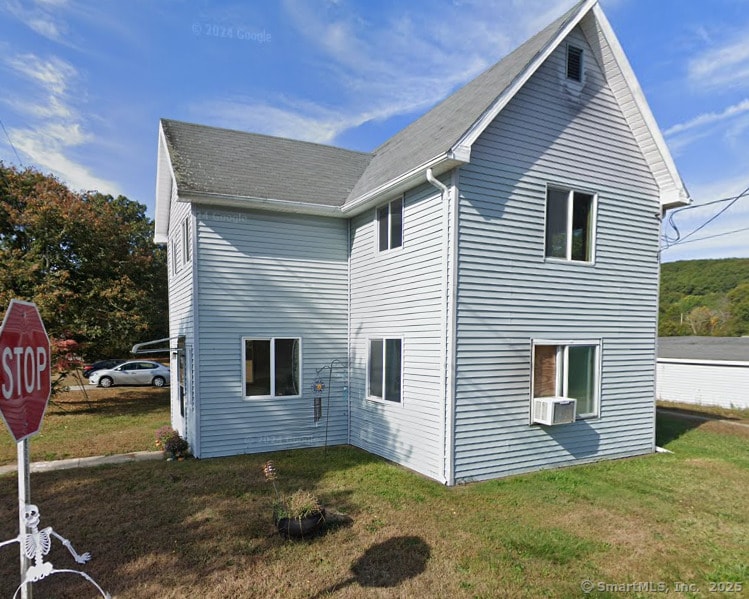 62 Benham Ave, Waterford, CT 06375 - view of home's exterior featuring a lawn and cooling unit