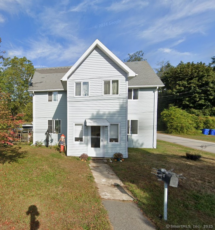 62 Benham Ave, Waterford, CT 06375 - traditional-style house featuring a front yard