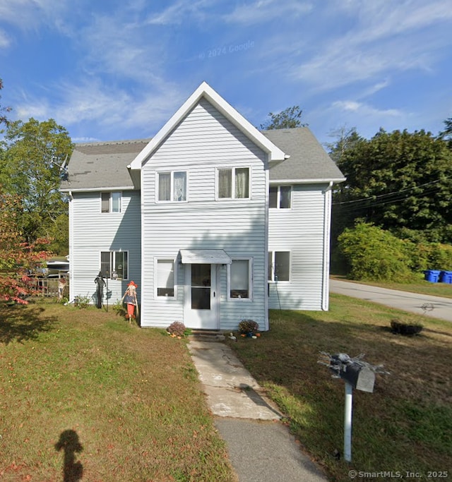62 Benham Ave, Waterford, CT 06375 - traditional-style house featuring a front yard