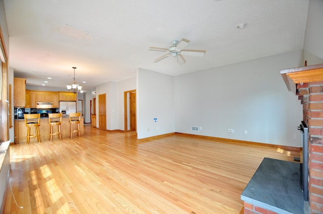 146 Pheasant Way S, Windsor, CT 06074 - unfurnished living room with light wood finished floors, a chandelier, a fireplace, a ceiling fan, and recessed lighting