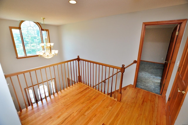 146 Pheasant Way S, Windsor, CT 06074 - stairway with a chandelier, wood finished floors, and recessed lighting