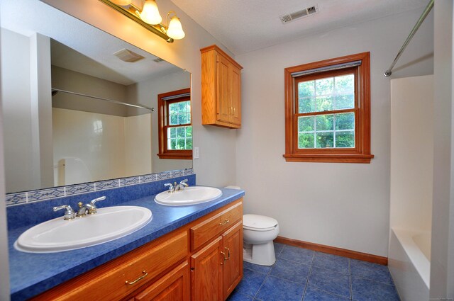 146 Pheasant Way S, Windsor, CT 06074 - bathroom featuring double vanity, shower / bath combination, and tile patterned floors