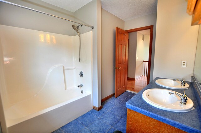 146 Pheasant Way S, Windsor, CT 06074 - full bath featuring shower / washtub combination, double vanity, tile patterned flooring, and a textured ceiling