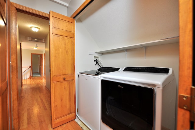 146 Pheasant Way S, Windsor, CT 06074 - washroom with separate washer and dryer and light wood-style flooring