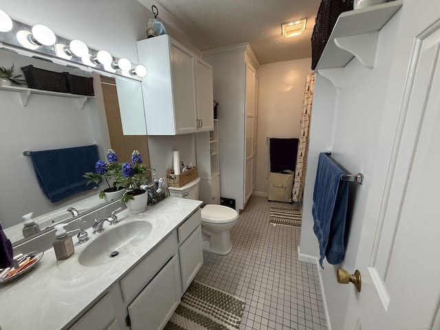 401 Essex Ct Unit 401, Torrington, CT 06790 - bathroom featuring vanity, a textured ceiling, and tile patterned floors