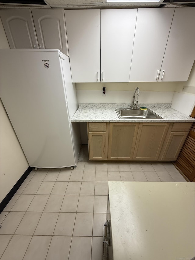 401 Essex Ct Unit 401, Torrington, CT 06790 - kitchen with a sink and freestanding refrigerator