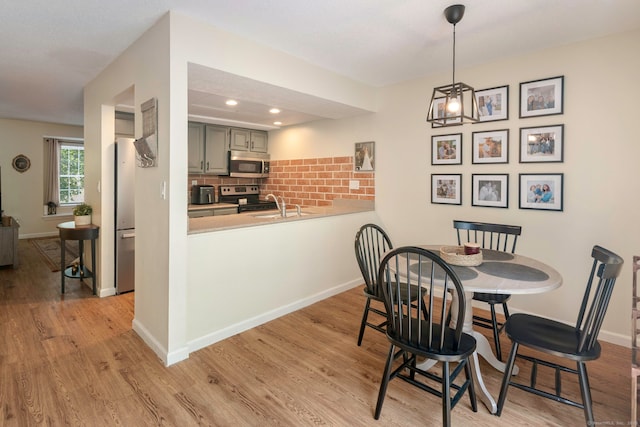 380 Hitchcock Rd Unit 227, Waterbury, CT 06705 - dining area with light wood-type flooring and recessed lighting