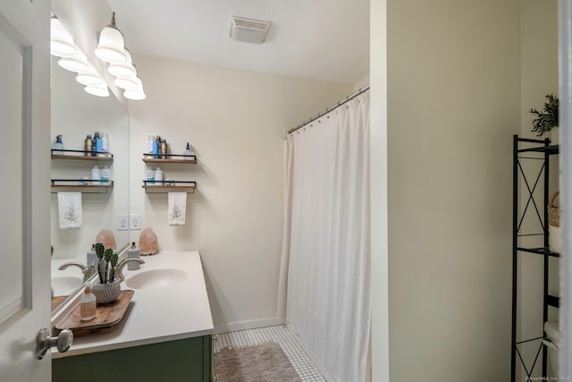 380 Hitchcock Rd Unit 227, Waterbury, CT 06705 - full bathroom featuring vanity, a shower with shower curtain, and tile patterned flooring