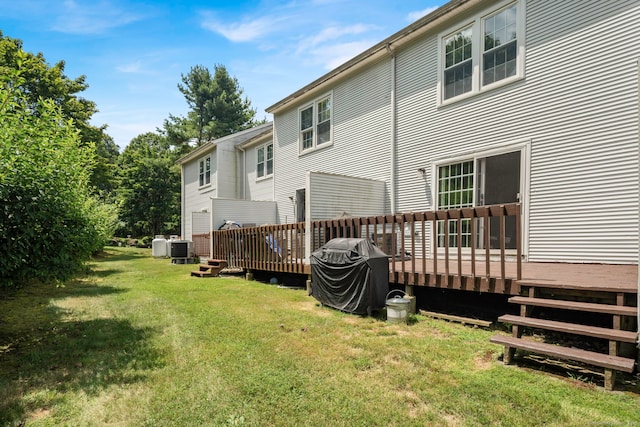 380 Hitchcock Rd Unit 227, Waterbury, CT 06705 - rear view of property with a yard and a wooden deck