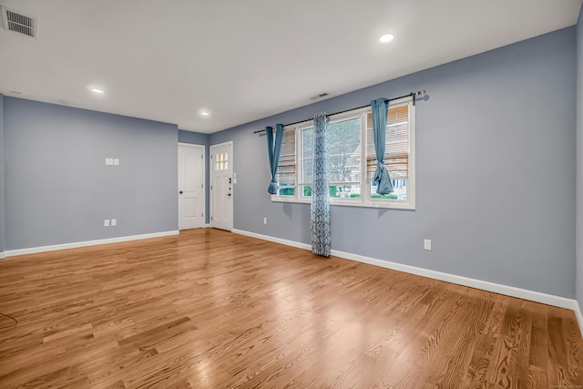 85 Floral Way, Stratford, CT 06615 - empty room featuring wood finished floors and recessed lighting
