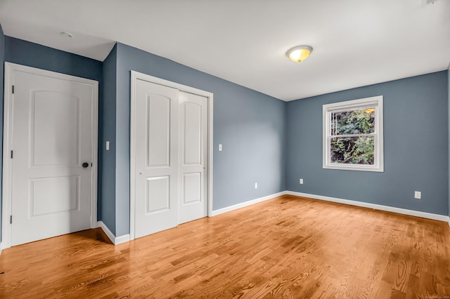 85 Floral Way, Stratford, CT 06615 - unfurnished bedroom featuring a closet and wood finished floors