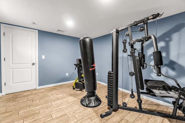 85 Floral Way, Stratford, CT 06615 - workout room with wood finished floors and baseboards
