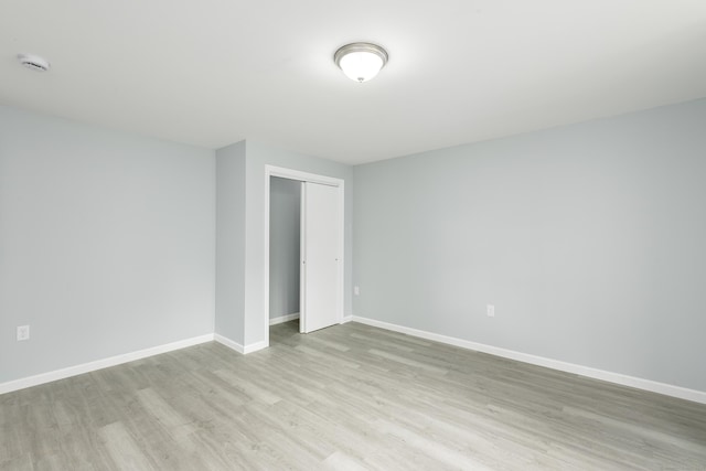 37 Martin St, Hartford, CT 06120 - unfurnished room with wood finished floors and a smoke detector