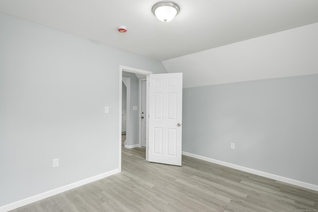 37 Martin St, Hartford, CT 06120 - spare room with light wood-type flooring, a smoke detector, and lofted ceiling