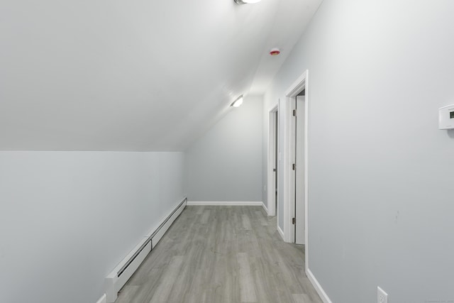 37 Martin St, Hartford, CT 06120 - additional living space with a baseboard radiator, light wood-type flooring, and vaulted ceiling