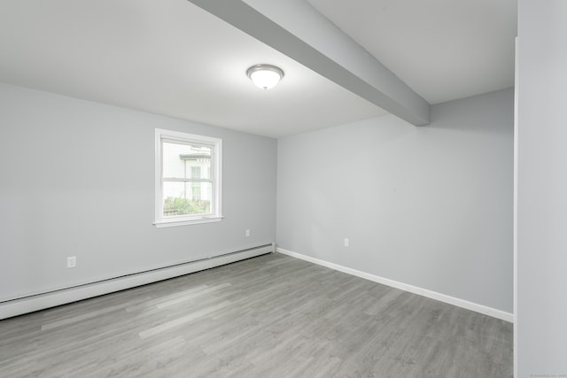 37 Martin St, Hartford, CT 06120 - unfurnished room with baseboard heating and wood finished floors