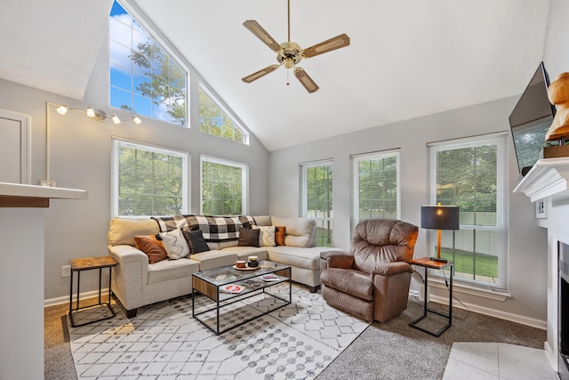 289 Carriage Crossing Ln Unit 289, Middletown, CT 06457 - living room featuring a fireplace with flush hearth, high vaulted ceiling, healthy amount of natural light, a ceiling fan, and carpet floors