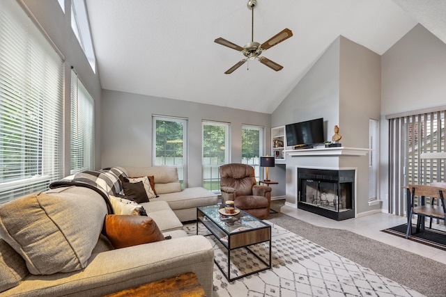 289 Carriage Crossing Ln Unit 289, Middletown, CT 06457 - living area featuring high vaulted ceiling, ceiling fan, a fireplace, and tile patterned flooring