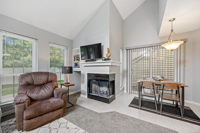 289 Carriage Crossing Ln Unit 289, Middletown, CT 06457 - tiled living room with a multi sided fireplace and high vaulted ceiling