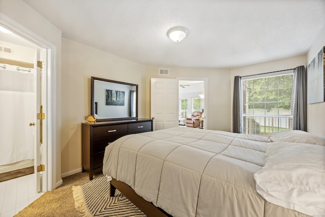 289 Carriage Crossing Ln Unit 289, Middletown, CT 06457 - carpeted bedroom with baseboards and a textured ceiling