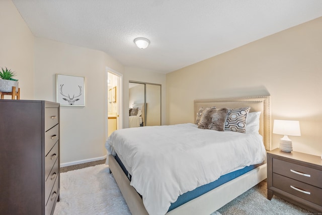 289 Carriage Crossing Ln Unit 289, Middletown, CT 06457 - bedroom with carpet flooring, connected bathroom, and a closet