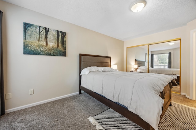 289 Carriage Crossing Ln Unit 289, Middletown, CT 06457 - bedroom featuring carpet, a closet, and a textured ceiling