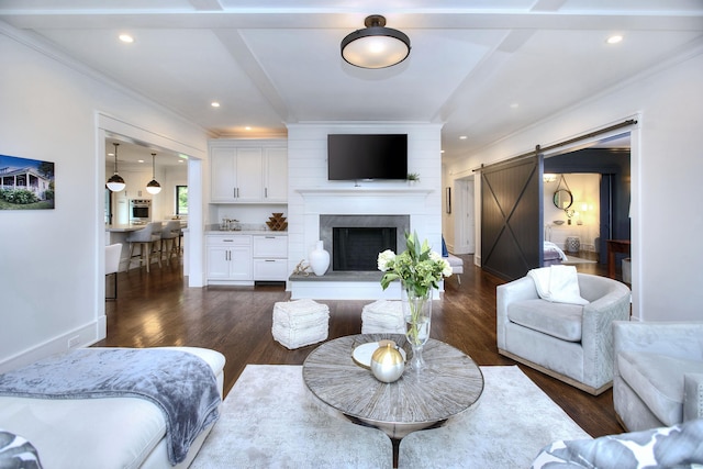 229 Good Hill Rd, Weston, CT 06883 - living room with a barn door, dark wood finished floors, recessed lighting, and ornamental molding
