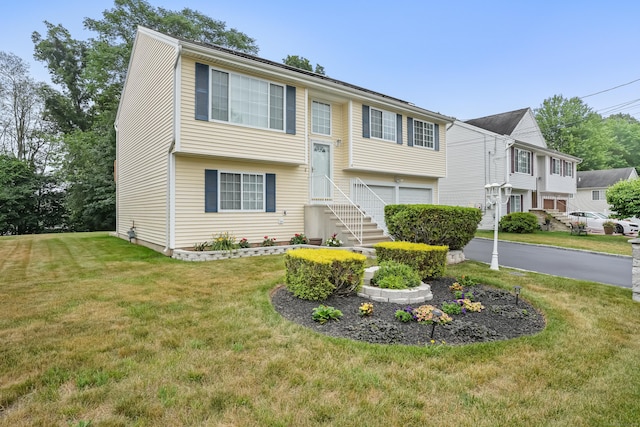 4 Russo Ter, New Haven, CT 06513 - split foyer home featuring an attached garage, a front yard, and driveway