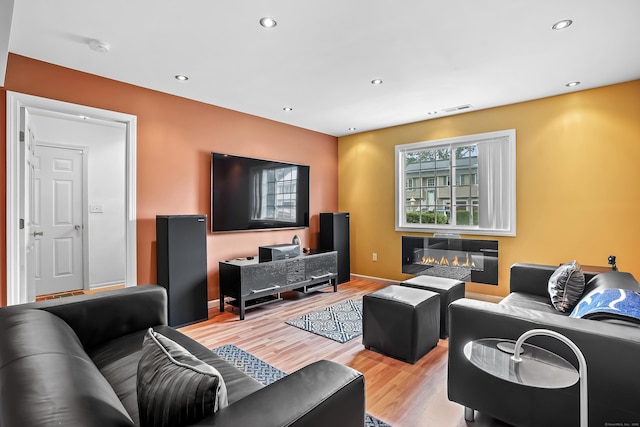 4 Russo Ter, New Haven, CT 06513 - living area featuring a glass covered fireplace, wood finished floors, and recessed lighting