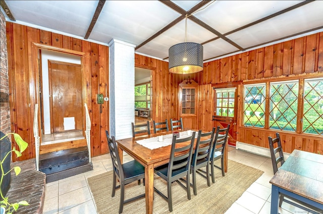 93 Glenrock Rd, Waterbury, CT 06706 - dining space with wood walls, light tile patterned floors, and a baseboard heating unit