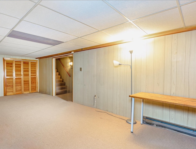 93 Glenrock Rd, Waterbury, CT 06706 - finished below grade area with stairs, carpet, a drop ceiling, and wood walls
