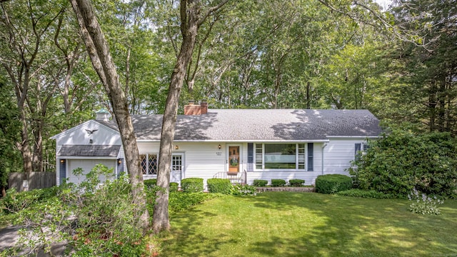 93 Glenrock Rd, Waterbury, CT 06706 - ranch-style home featuring a chimney and an attached garage