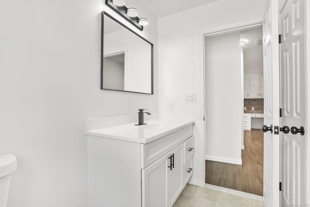 75 Beecher Ave, Shelton, CT 06484 - bathroom with vanity and backsplash