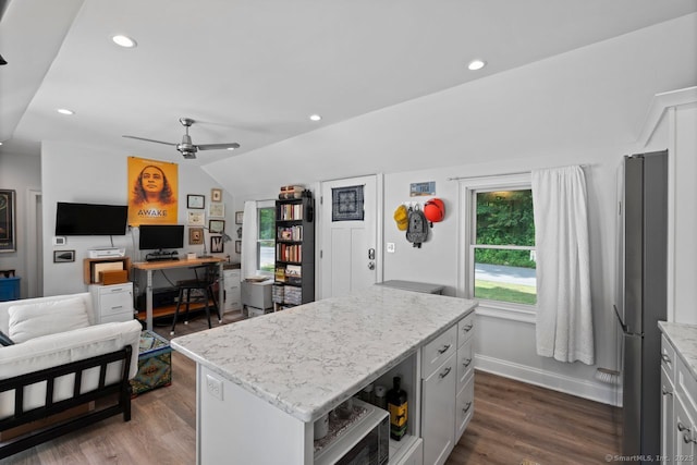 20 Meadow Woods Rd, Essex, CT 06426 - kitchen featuring an office area, dark wood-style flooring, freestanding refrigerator, lofted ceiling, and light stone counters