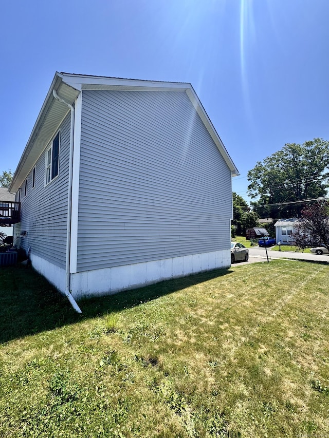 71 Harold St, West Haven, CT 06516 - view of side of home featuring a lawn
