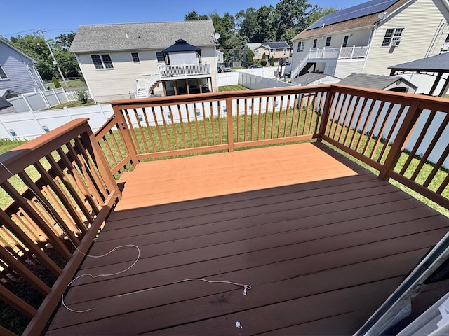 71 Harold St, West Haven, CT 06516 - wooden deck featuring a residential view, a fenced backyard, a gazebo, and stairs