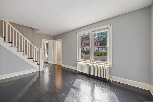 120 Monmouth Ave, Waterbury, CT 06704 - entrance foyer featuring radiator, hardwood / wood-style flooring, and stairway