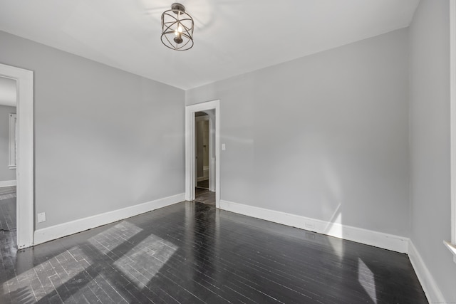 120 Monmouth Ave, Waterbury, CT 06704 - empty room with dark wood-type flooring