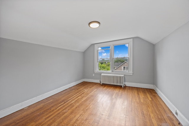 120 Monmouth Ave, Waterbury, CT 06704 - bonus room with radiator heating unit, lofted ceiling, and wood-type flooring