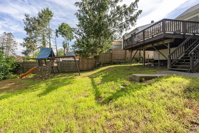120 Monmouth Ave, Waterbury, CT 06704 - fenced backyard featuring a deck, a playground, and stairway