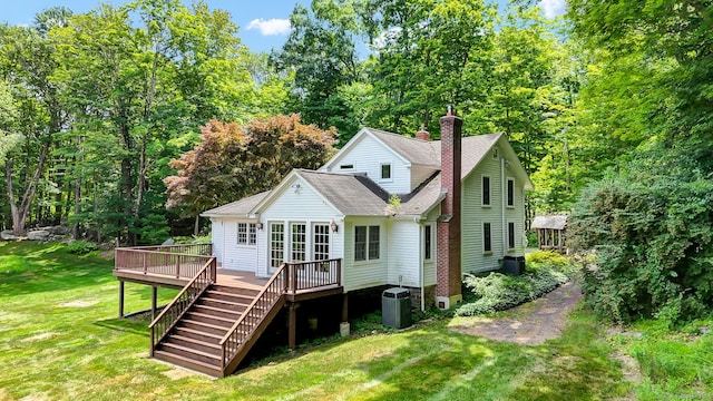 795 Rte 148, Killingworth, CT 06419 - back of property featuring roof with shingles, a wooden deck, a chimney, a yard, and stairs
