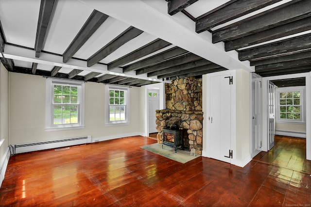 795 Rte 148, Killingworth, CT 06419 - unfurnished living room with a baseboard radiator, wood-type flooring, beam ceiling, and a wood stove